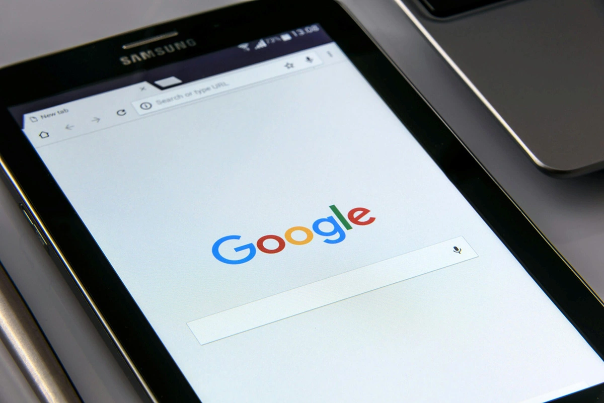 How to Trade Google in 2025 - 8 Expert Methods 1 Samsung tablet with Google search page visible, symbolizing tech and internet trading.