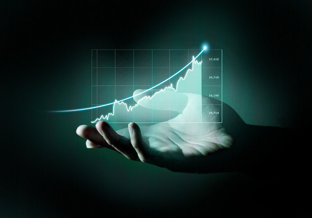 Index Futures: How They Work and Their Role in Market Predictions 1 Digital stock chart showing an upward trend held by a hand in a futuristic display.